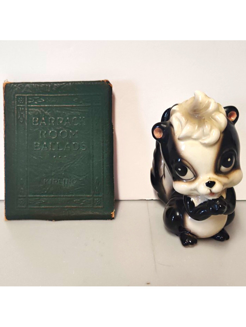 Vintage Big Eye Ceramic Skunk Figurine & Kipling Barrack Room Ballads Mini Book